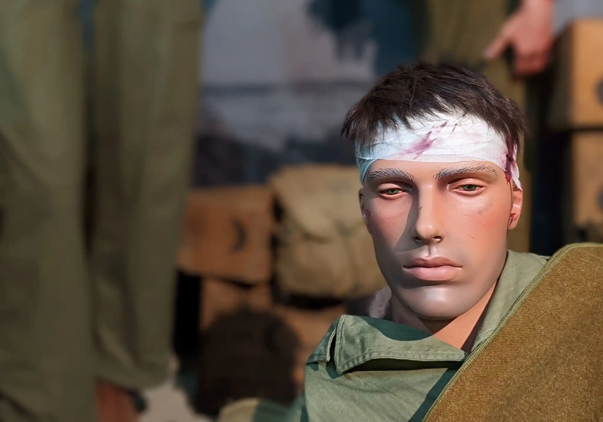 Wounded soldier at Omaha, scene of the Normandy Victory Museum