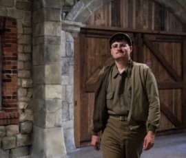 A reenactor enters the Normandy Victory Museum in 2023