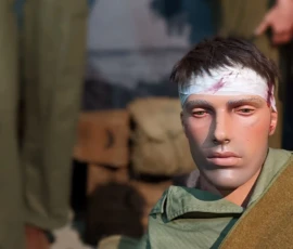 Wounded soldier at Omaha - Scene from Normandy Victory Museum